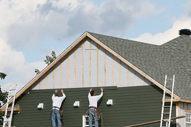 Professional Siding technician working in Balsam Grove, NC